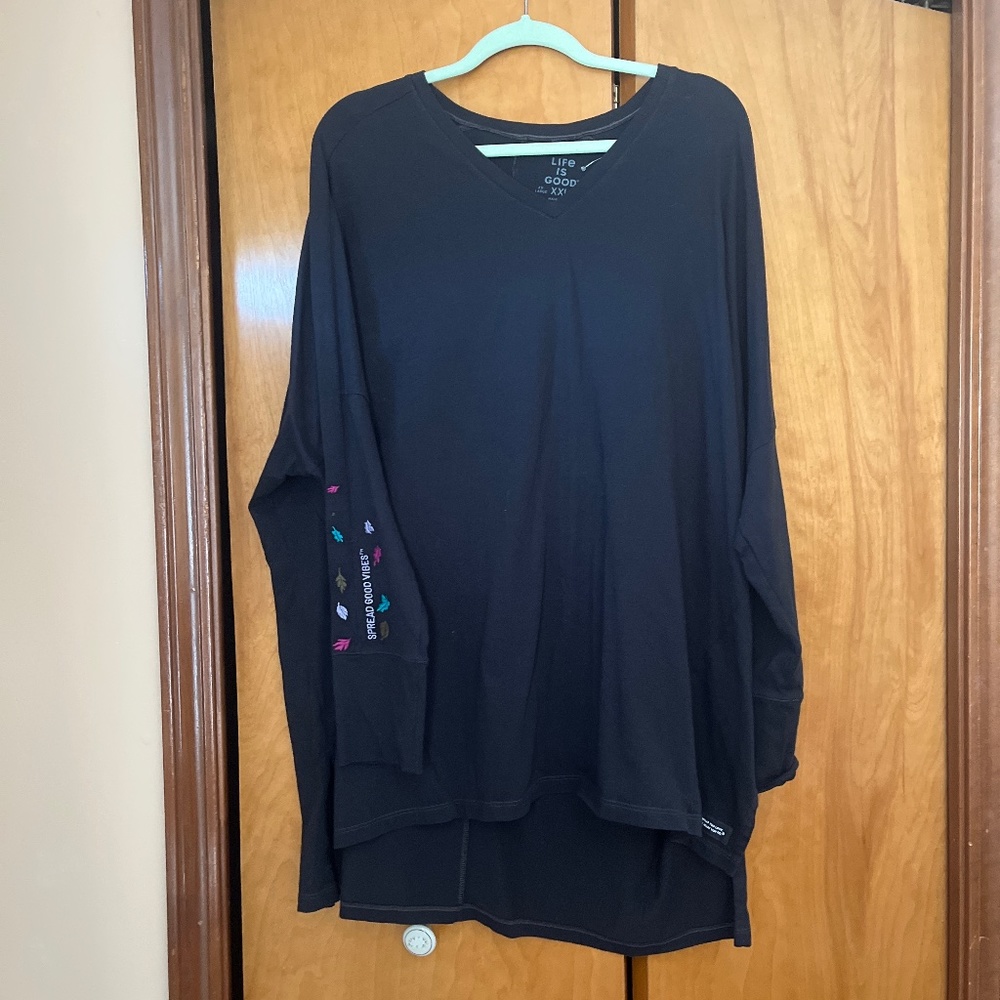 Black XXL big shirt. Long sleeves are decorated with “life is good “ and assorte